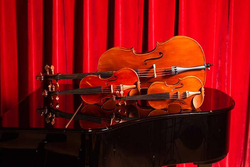 La Scala Instruments displayed on top of a piano